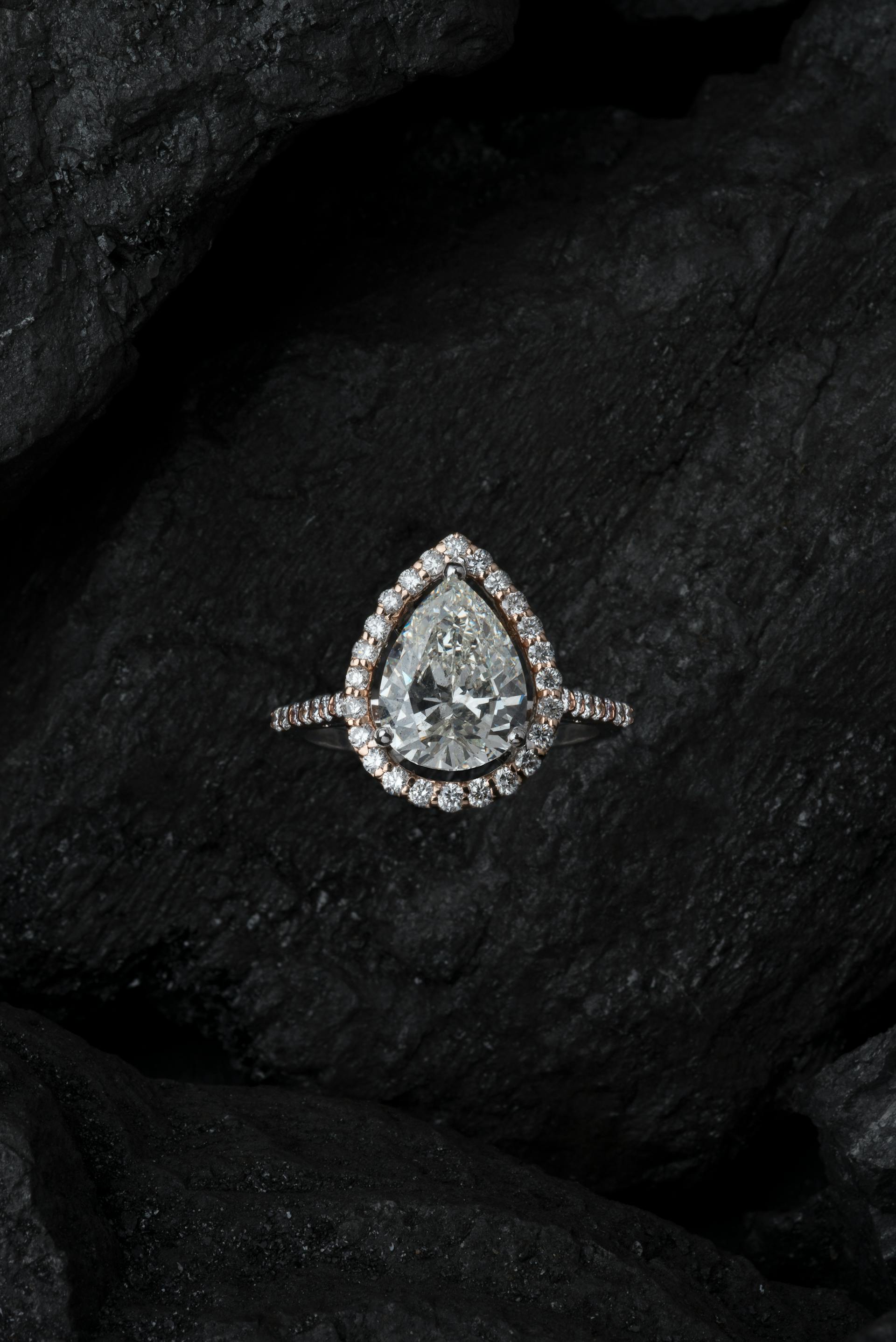 Luxury diamond ring close-up on dark background